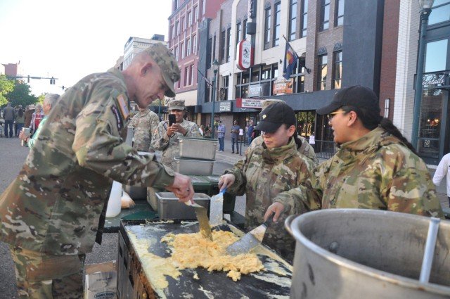 Soldiers volunteer during Western Heritage Street Breakfast